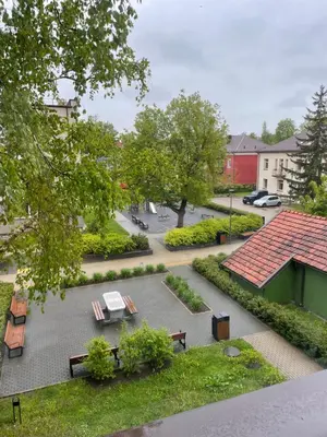 an overhead view of a park with benches and trees at Centro apartamentai in Biržai