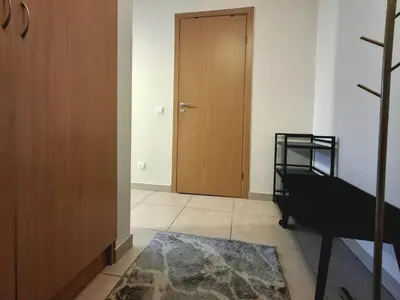 a room with a door and a rug and a door at Cozy Studio in Vilnius Old Town in Vilnius