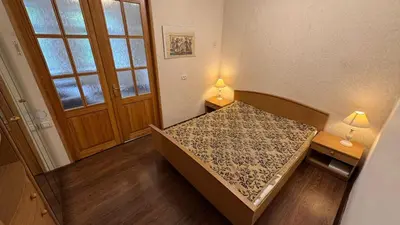 a small room with a bed and a window at Cozy stay Vilnius in Vilnius