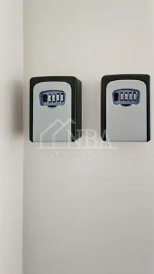 two electrical outlets on the side of a refrigerator at Guest house Sunrise in Šiauliai