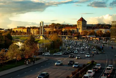 a busy city street filled with lots of cars at Apartamentai Zibutės in Kaunas