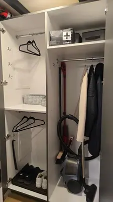 a walk in closet with some shoes and shoes at BlueLoft Kaunas in Kaunas