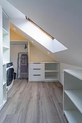 a laundry room with a washer and dryer at Symphony Apartment with free parking in Kaunas