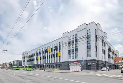 a large white building on the side of a street at RADIO CITY Loft 345 by Domvia in Kaunas