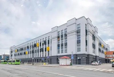 a large white building on the corner of a street at RADIO CITY Loft 435 by Domvia in Kaunas