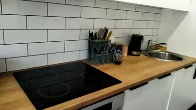 a kitchen counter top with a sink and a counter sidx sidx sidx at Sv2 Marie Oldtown SELF CHECK-IN by QuarterStays in Vilnius