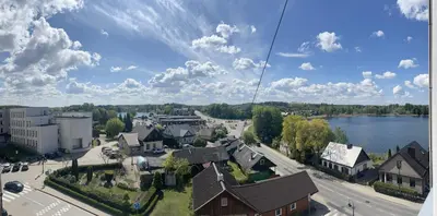 an aerial view of a town with a river and houses at Butas Trakuose su vaizdu į ežerus-Lake view apartment in Trakai in Trakai