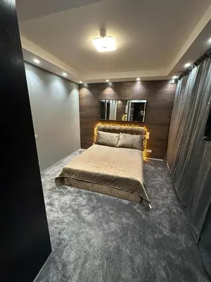 a bedroom with a bed and a mirror at B&M Romantic room Self check-in in Vilnius