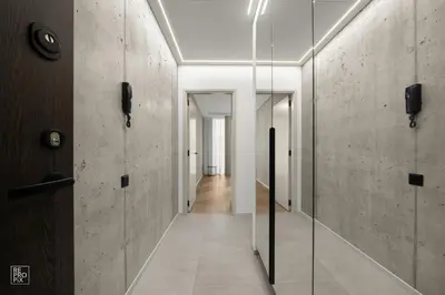 a hallway with a glass door and a hallway with a hallway at Comfortable 2 BD Apartment by Domvia in Kaunas