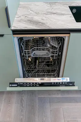 an oven with its door open in a kitchen at River View Apartment with free parking in Kaunas