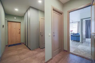 an empty hallway with two doors and a room at River View Apartment with free parking in Kaunas