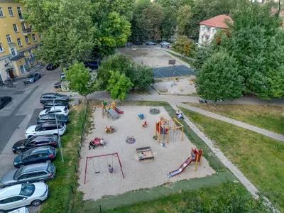 an aerial view of a playground in a parking lot at Vilnius Old Town Amber Penthouse in Vilnius