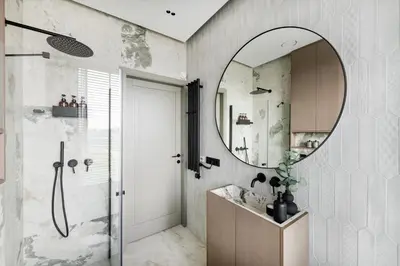 a bathroom with a shower and a mirror at Sky&River Towe Apartments Kaunas City Center in Kaunas