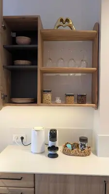 a kitchen counter with a counter top with a kitchen appliance at Kaunas City Centre Apartment Self Check-In & AC in Kaunas