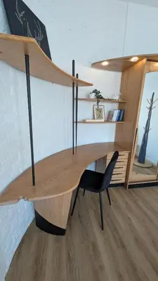 a wooden desk in a room with a chair at Kaunas City Centre Apartment Self Check-In & AC in Kaunas