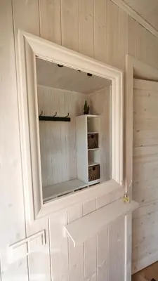 a mirror on the wall of a room at Gervių takas 1