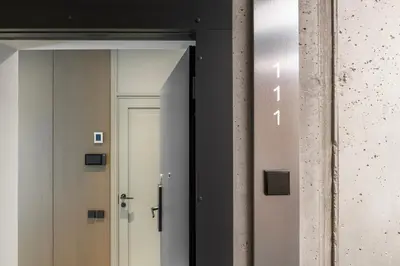 a hallway with a door in a room at CityView Kaunas Center in Kaunas