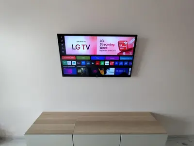 a flat screen tv hanging on a wall at J&N Hause in Visaginas