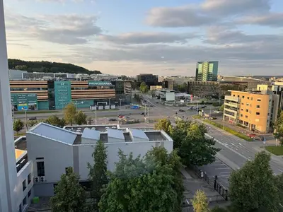 an aerial view of a city with buildings and a street at Panorama City View Apartment in Vilnius