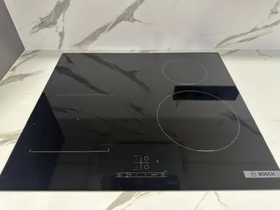 a laptop computer sitting on top of a counter at Butas nuomai truputį daugiau nei kilometras pėsčiomis iki Senamiesčio in Kaunas