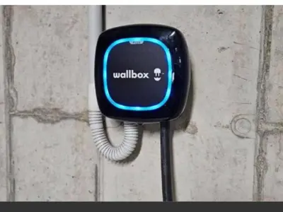 a cell phone is attached to a wall at HaPPy Inn PLENTIFUL OLD Town Studio, Self check-in, AC, Parking in the underground Garage in Vilnius