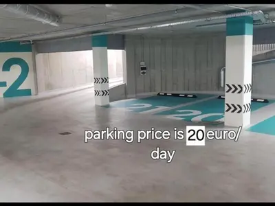 a parking garage with a parking price is curb day at HaPPy Inn PLENTIFUL OLD Town Studio, Self check-in, AC, Parking in the underground Garage in Vilnius