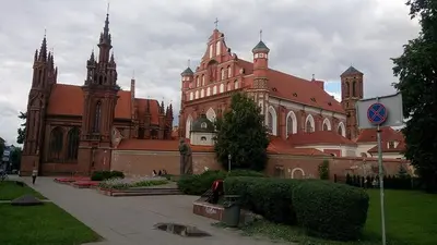 a large brick building with a cathedral at Litinterp in Vilnius