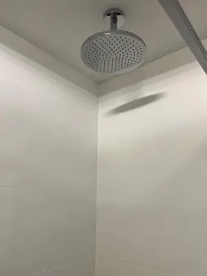 a ceiling with a light in a room at Nemuno Banga in Druskininkai