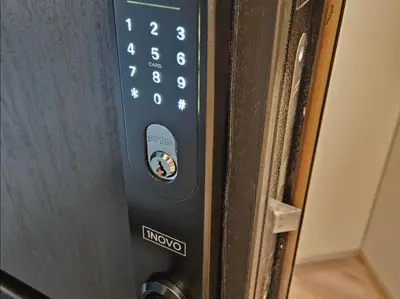 a close up of a door with a remote control at Happy Inn Sweet Old Town Studio, Self check in, Parking in Vilnius