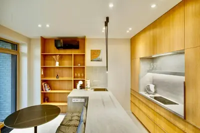 a kitchen with a table and a counter top at Flat in Vlinius city center in Vilnius