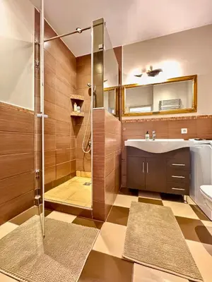 a bathroom with a shower and a sink at Old Town T8 SELF Check In in Vilnius