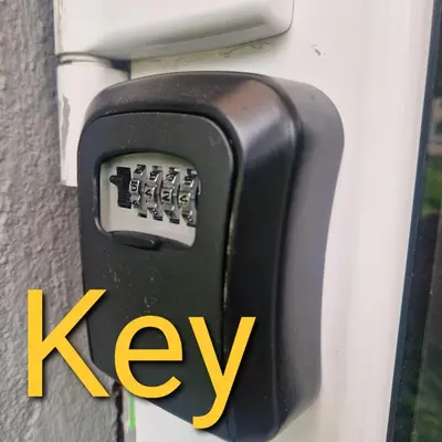a key card on the side of a building at Apartamentai Grigiškes in Grigiškės