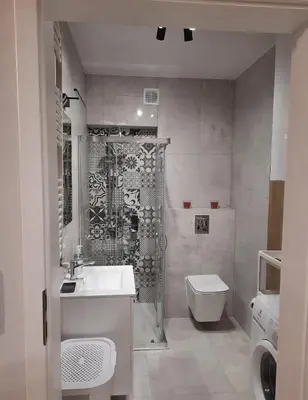 a bathroom with a shower and a sink and a toilet at Krivių Street Residential in Vilnius