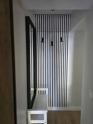 a room with a large window with a mirror at Central Stay in Šiauliai in Šiauliai