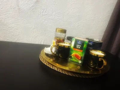 a tray with two cups of coffee on a table at Studio 10 min walk from old town in Vilnius