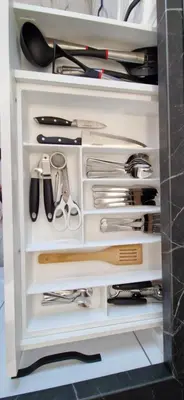 a drawer filled with lots of utensils at Korsako apartamentai in Šiauliai