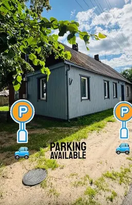 a parking available sign in front of a house at Relaxation Corner on Kranto in Kaunas