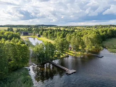an island in the middle of a river at Galuonu vilos Ezero in Inturkė