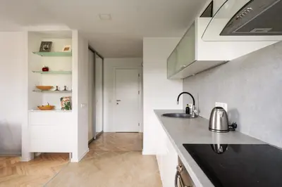 a kitchen with a sink and a counter top at Ducks in the yard - Self Check in in Vilnius