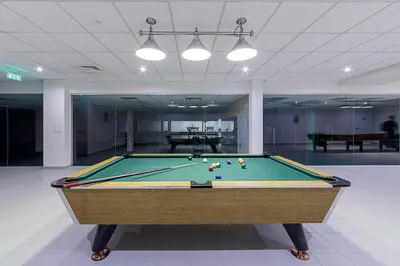a pool table with balls on it in a room at Medical SPA 