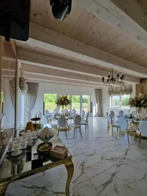 a large dining room with a table and chairs at Modern design in quiet nature