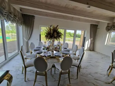 a dining room with a table and chairs at Modern design in quiet nature