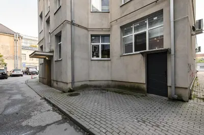 a building with a door on the side of a street at D-loft in Kaunas