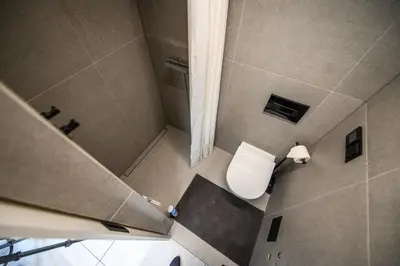 an overhead view of a bathroom with a toilet at D-loft in Kaunas