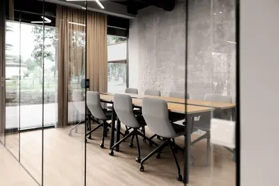 a dining room with a table and chairs at Aparthotel Nemunas in Druskininkai
