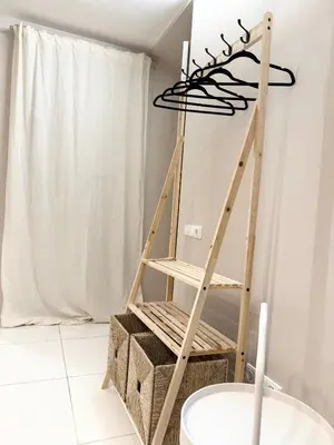 a room with a wooden ladder and a shelf at Charming City-Center Apt I ᴄohost in Vilnius