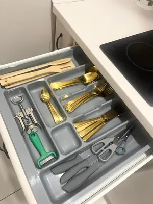 a drawer filled withrenches and other kitchen utensils at Charming City-Center Apt I ᴄohost in Vilnius