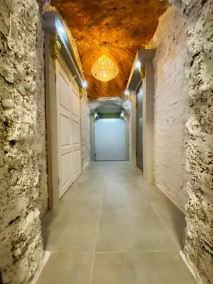 a hallway of a building with a garage with a ceiling at Host 1 apartment in Kaunas