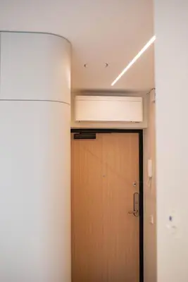 a door in a room with a ceiling at Stylish apartment next to the center in Vilnius