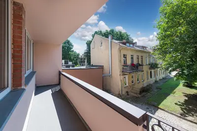 an apartment balcony with a view of a building at 2-BD Apartment Winery by Polo Apartments in Kaunas